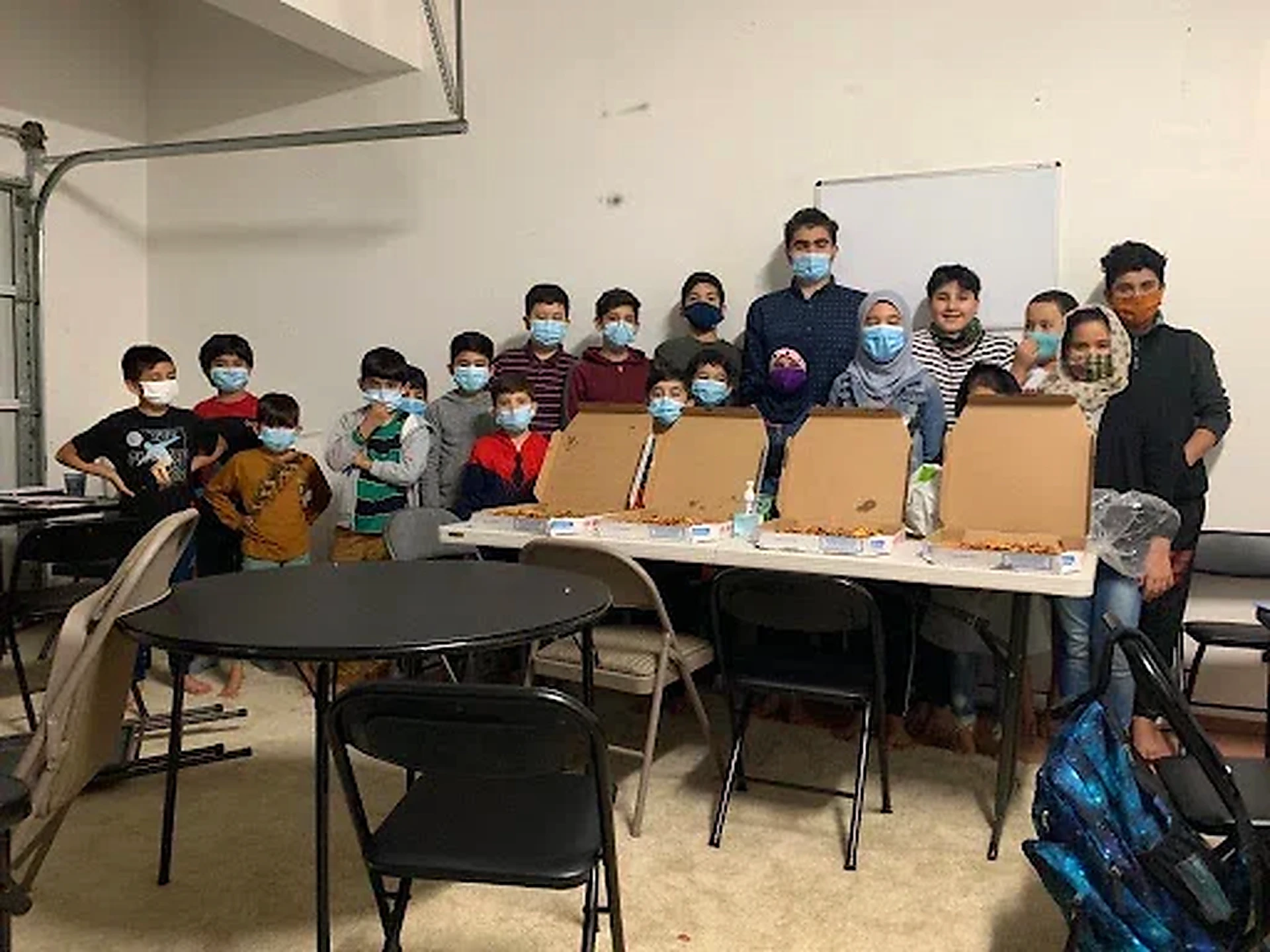 Students sharing a meal during programming