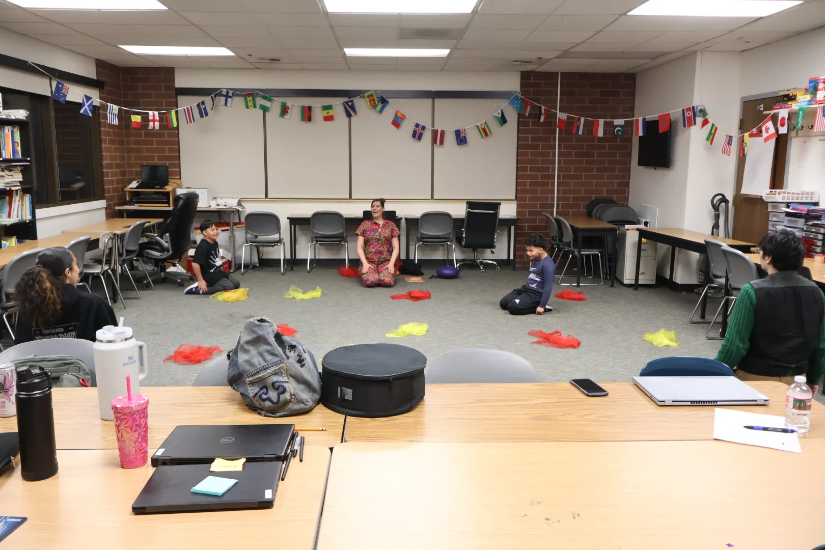 Students taking part in a group yoga and mindfulness session